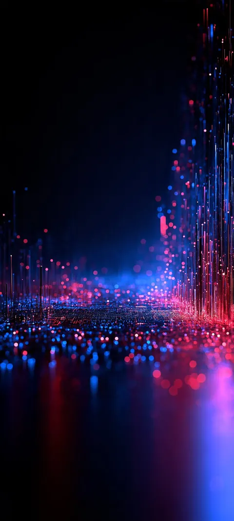Vertical streams of red and blue light particles pour down over a dark, reflective floor.