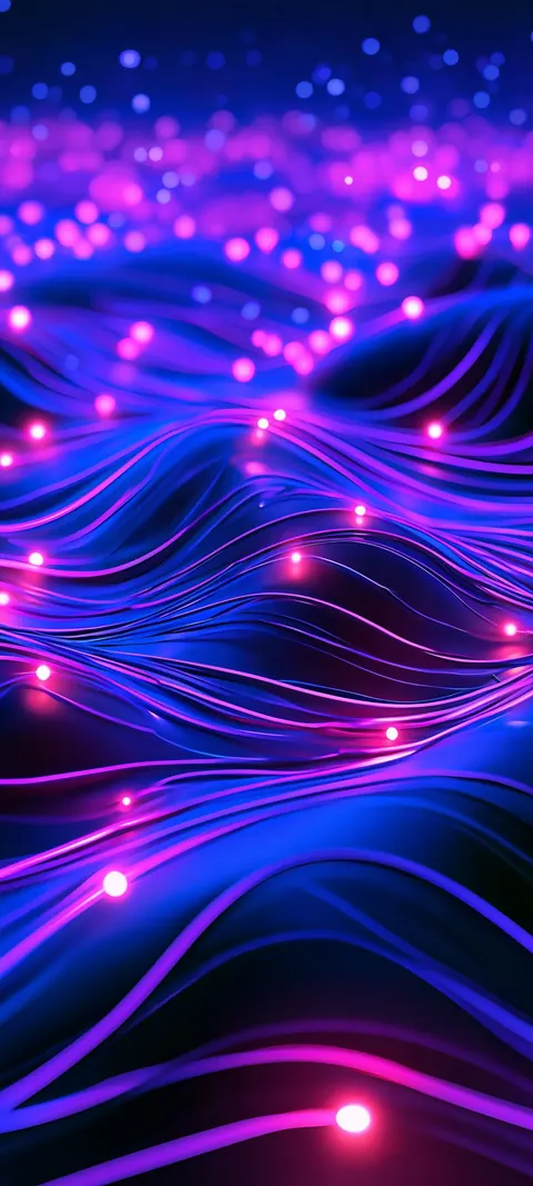 Rolling indigo waves of light carry drifting pink and blue sparks across the night.